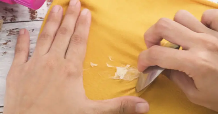 how to get eyelash glue off clothes